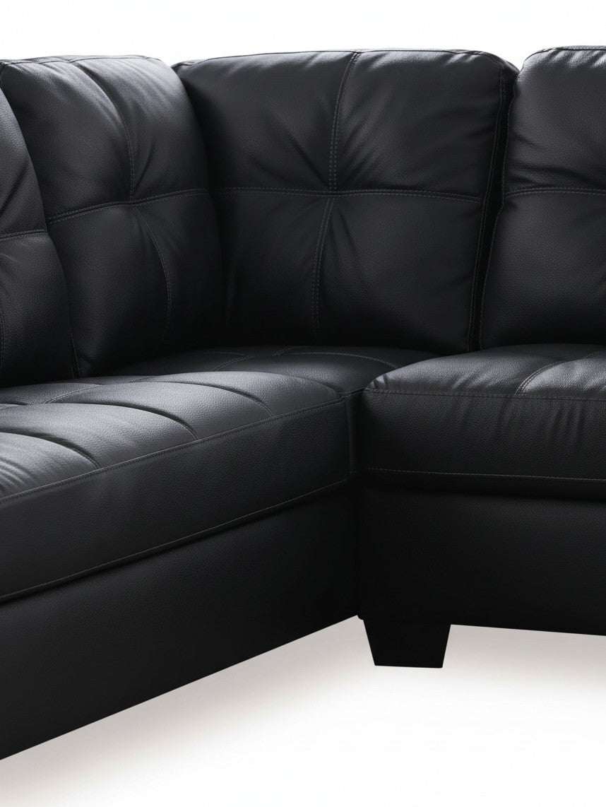 Sofa sectionnel noir TOCO Meubles en cuir avec coutures capitonnées et design moderne en angle