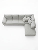 Sofa sectionnel gris TOCO Meubles avec méridienne et coussins décoratifs à motifs, vue de dessus.