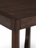 Table d'appoint Louma de TOCO Meubles en bois massif brun foncé avec coins arrondis et finition élégante