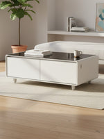 Table basse intelligente TOCO Meubles Party Time blanche avec tiroirs et panneau de commande dans un salon moderne