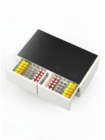 Table basse intelligente TOCO Meubles Party Time blanche avec deux tiroirs ouverts et panneau de commande tactile