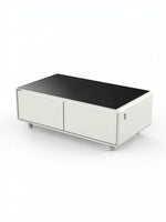 Table basse intelligente TOCO Meubles Party Time blanche avec plateau noir, deux tiroirs et commandes intégrées.