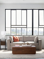 Table basse TOCO Meubles en noyer américain massif avec plateau relevable et rangement dans un salon moderne