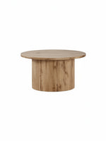 Table basse ronde TOCO Meubles en bois clair avec un pied central cannelé au design contemporain et scandinave