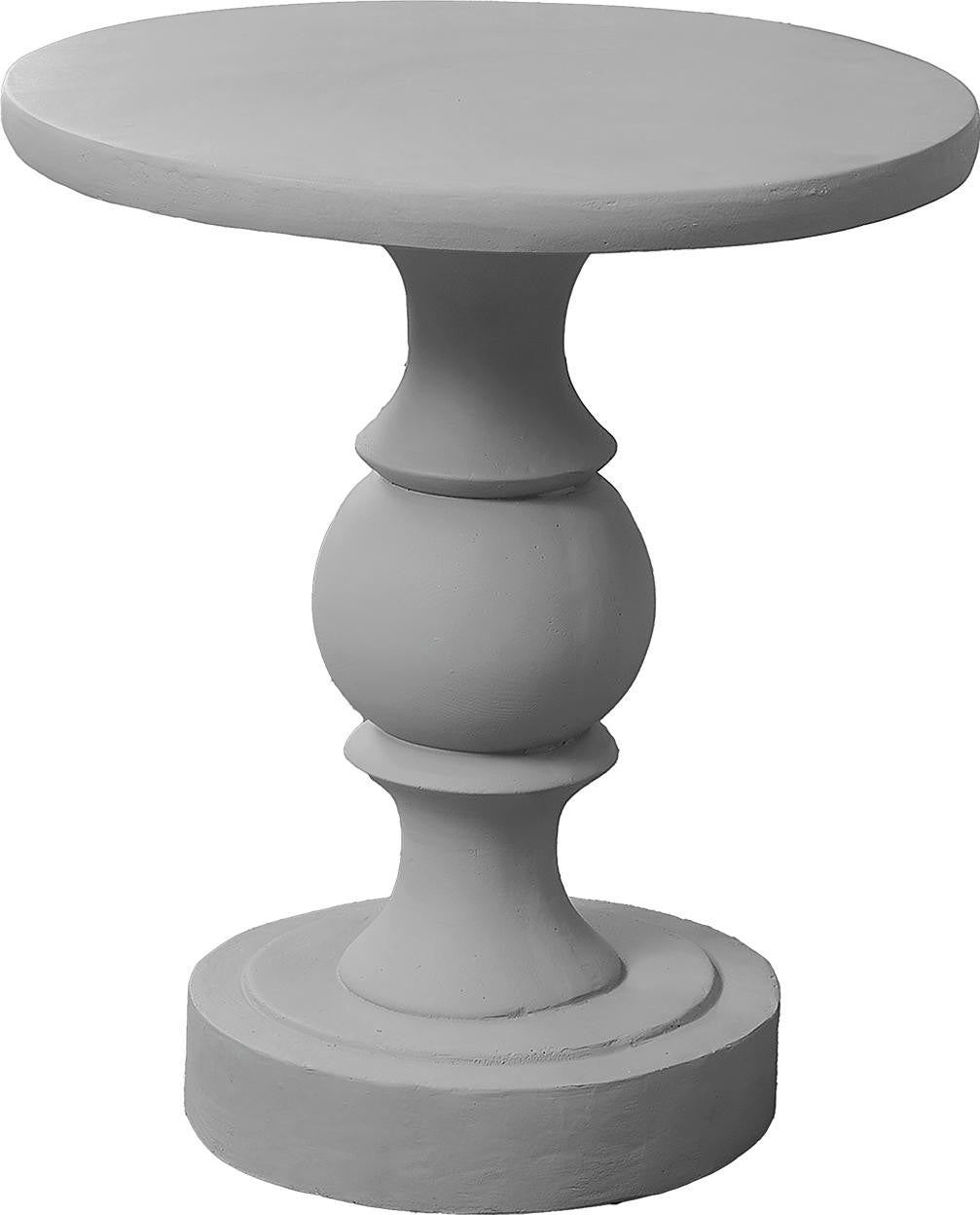 Table d'appoint ronde grise en oxyde de magnésium de TOCO Meubles, avec un pied sculpté et une base circulaire.
