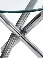 Base croisée en métal chromé brillant de la table ronde TOCO Meubles Lara avec plateau en verre trempé transparent