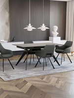 Table de salle à manger Liora TOCO Meubles en céramique grise extensible avec pieds en métal noir, 4 chaises grises assorties.