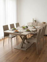 Table de salle à manger extensible Margo de TOCO Meubles avec plateau beige et base centrale croisée moderne