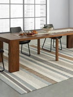 Table de salle à manger extensible TOCO Meubles en noyer américain massif dans un intérieur moderne et lumineux