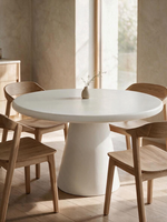 Table de salle à manger ronde TOCO Meubles Elsa blanche avec plateau effet ciment et base conique centrale