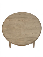 Vue de dessus de la table ronde Cora de TOCO Meubles en bois naturel avec placage de chêne et panneaux rabattables.
