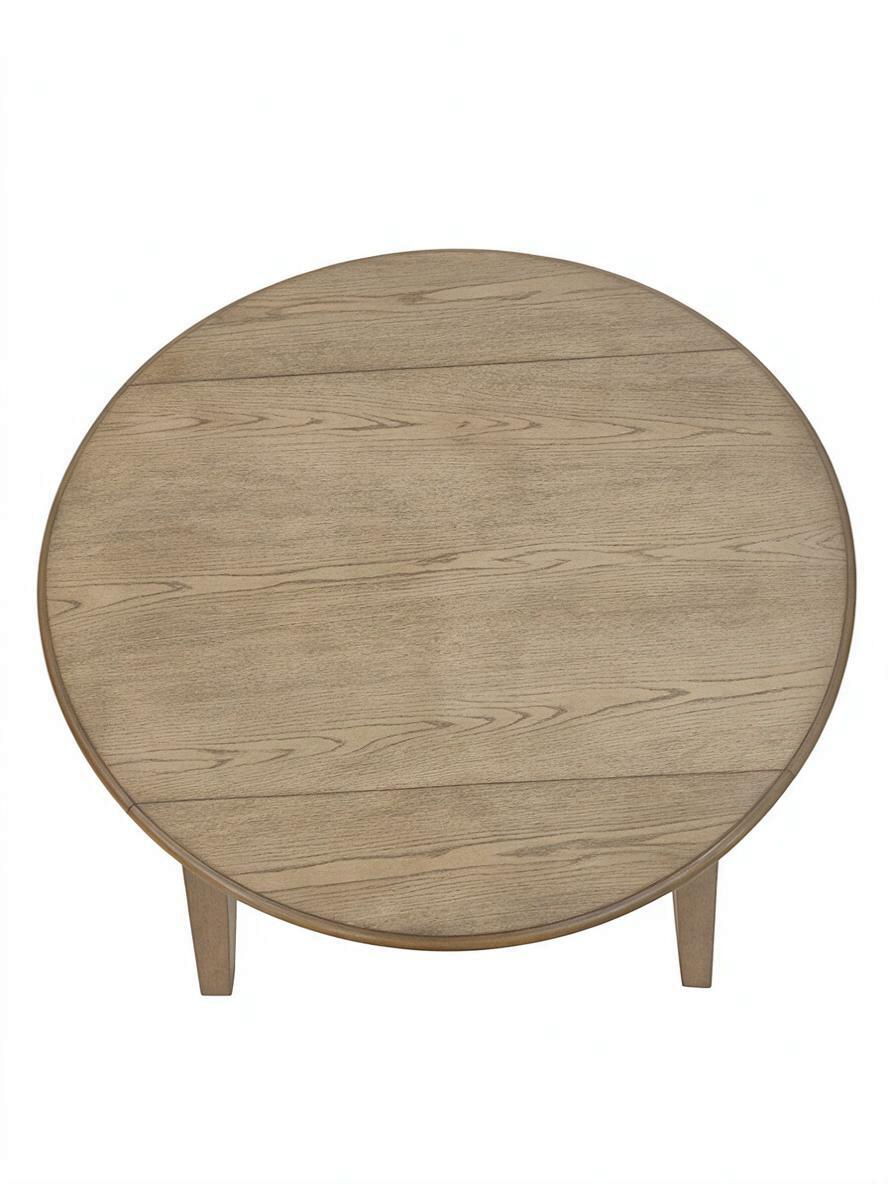Vue de dessus de la table ronde Cora de TOCO Meubles en bois naturel avec placage de chêne et panneaux rabattables.