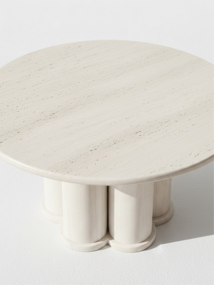 Table de salon ronde TOCO Meubles Harmonie en pierre claire avec base architecturale à colonnes cylindriques