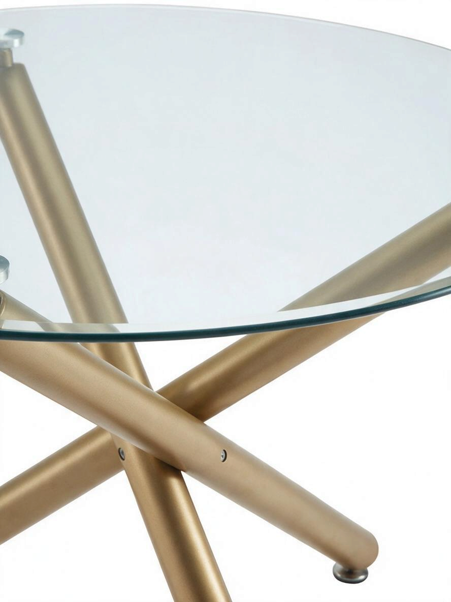 Table ronde Milla de TOCO Meubles avec plateau en verre trempé et base géométrique en métal fini or vieilli