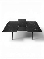 Table de salle à manger extensible Remy TOCO Meubles en marbre noir avec plateau extensible et pieds noirs