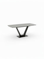 Table de salle à manger Belza TOCO Meubles avec plateau rectangulaire gris effet pierre et pied central en V noir