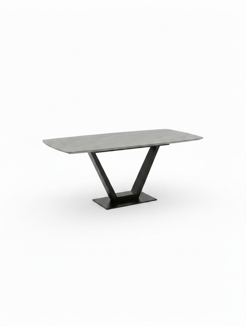 Table de salle à manger Belza TOCO Meubles avec plateau rectangulaire gris effet pierre et pied central en V noir