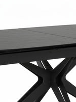 Table de salle à manger extensible Orano par TOCO Meubles avec plateau noir texturé et base en métal géométrique