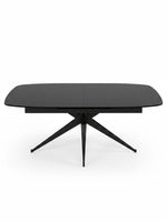 Table de salle à manger extensible Orano noire par TOCO Meubles avec un plateau rectangulaire et pieds croisés
