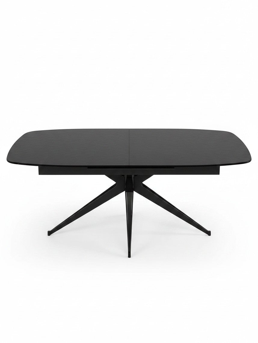 Table de salle à manger extensible Orano noire par TOCO Meubles avec un plateau rectangulaire et pieds croisés
