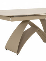 Table de salle à manger extensible Camilia TOCO Meubles avec plateau clair et base arquée moderne couleur taupe