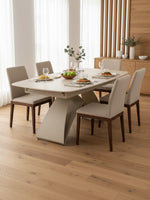 Table de salle à manger extensible Camilia de TOCO Meubles avec plateau beige et base centrale moderne