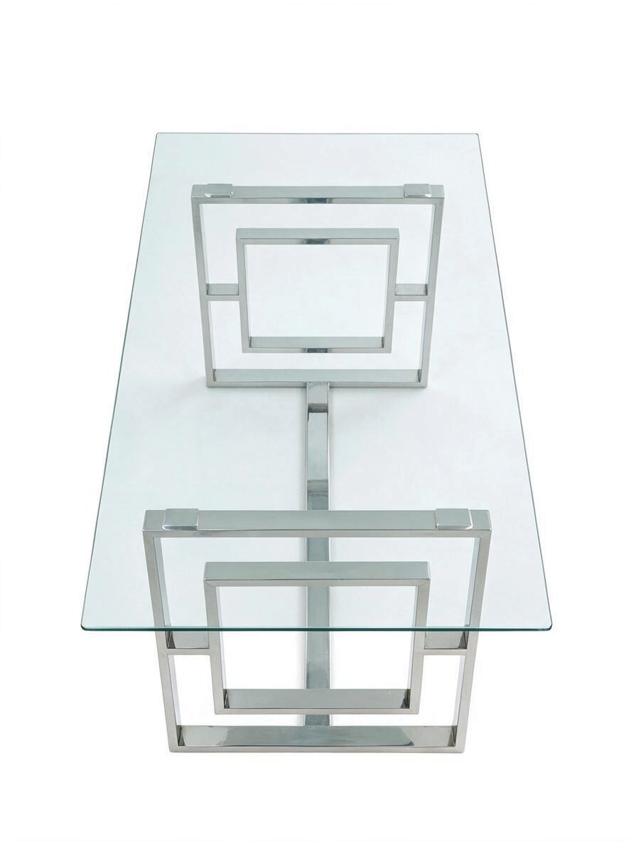 Table de salle à manger Leros TOCO Meubles avec plateau en verre trempé et base géométrique en acier argent poli