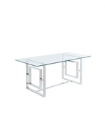 Table de salle à manger TOCO Meubles Leros rectangulaire avec plateau en verre et base géométrique en argent poli
