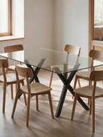 Table de salle à manger Elora TOCO Meubles avec plateau en verre trempé et base géométrique en métal noir mat