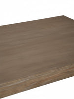 Gros plan sur le plateau rectangulaire en bois gris de la table de salon Carito par TOCO Meubles