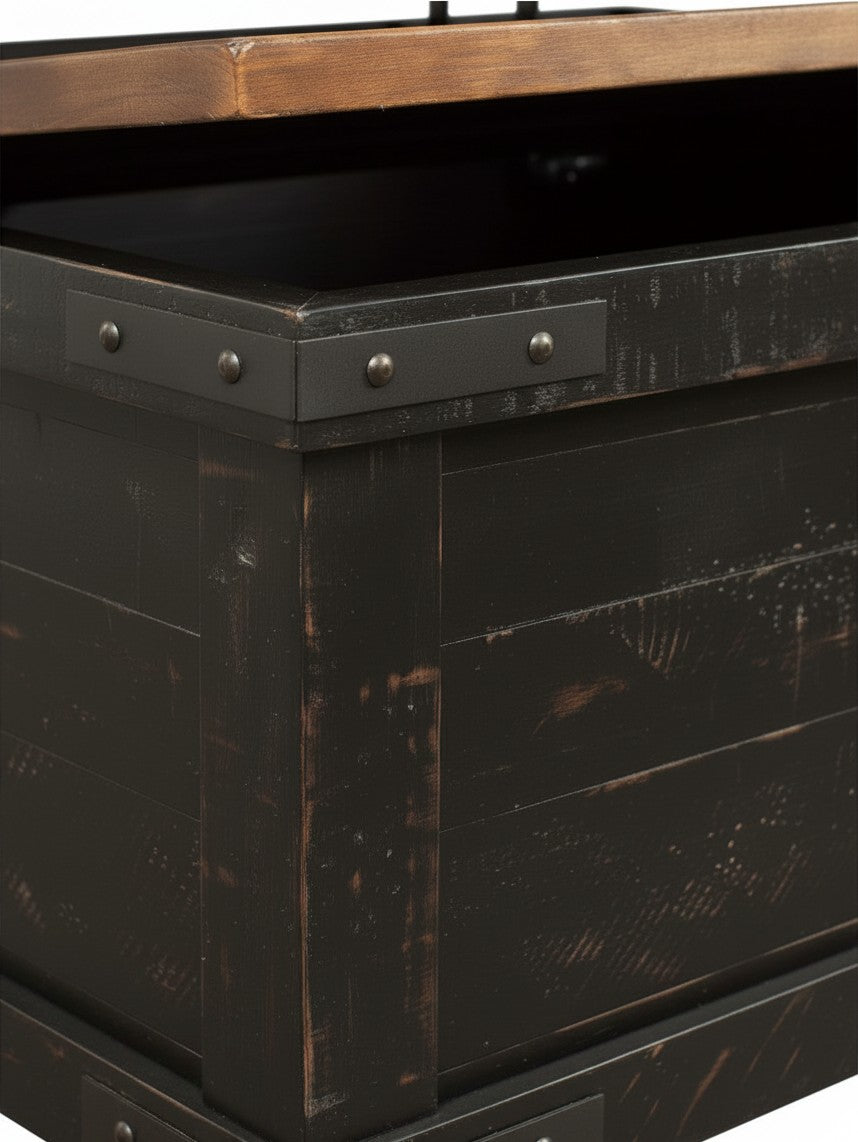 Détail du coin de la table de salon Arbeck TOCO Meubles en bois noir vieilli avec accents métalliques rivetés