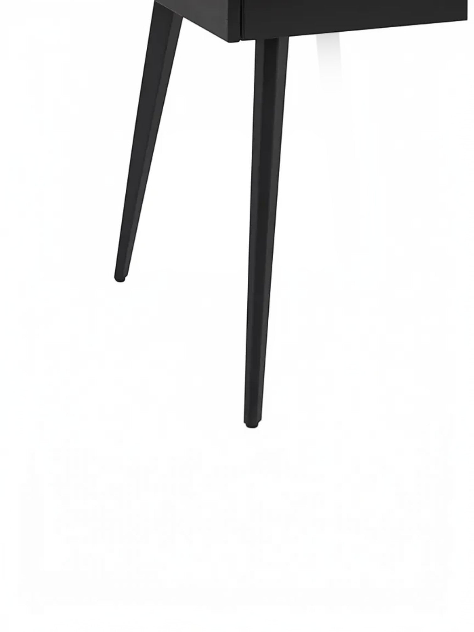 Table de salle à manger TOCO Meubles Studio avec plateau en pierre frittée grise et pieds en métal noir inclinés.