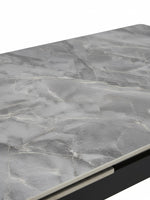 Plateau de table TOCO Meubles Studio en pierre frittée grise avec veinage effet marbre et structure en métal noir