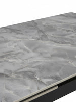 Plateau de table TOCO Meubles Studio en pierre frittée grise avec veinage effet marbre et structure en métal noir