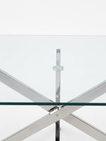 Table de salle à manger Malia par TOCO Meubles avec plateau en verre transparent et base croisée en métal chromé