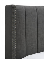 Tête de lit TOCO Meubles Lorenzo en tissu gris capitonné avec détails de clous décoratifs argentés