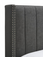 Tête de lit TOCO Meubles Lorenzo en tissu gris capitonné avec détails de clous décoratifs argentés
