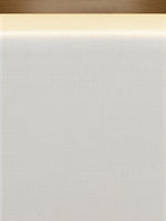 Gros plan sur la tête de lit rembourrée en tissu texturé beige avec éclairage DEL intégré de TOCO Meubles