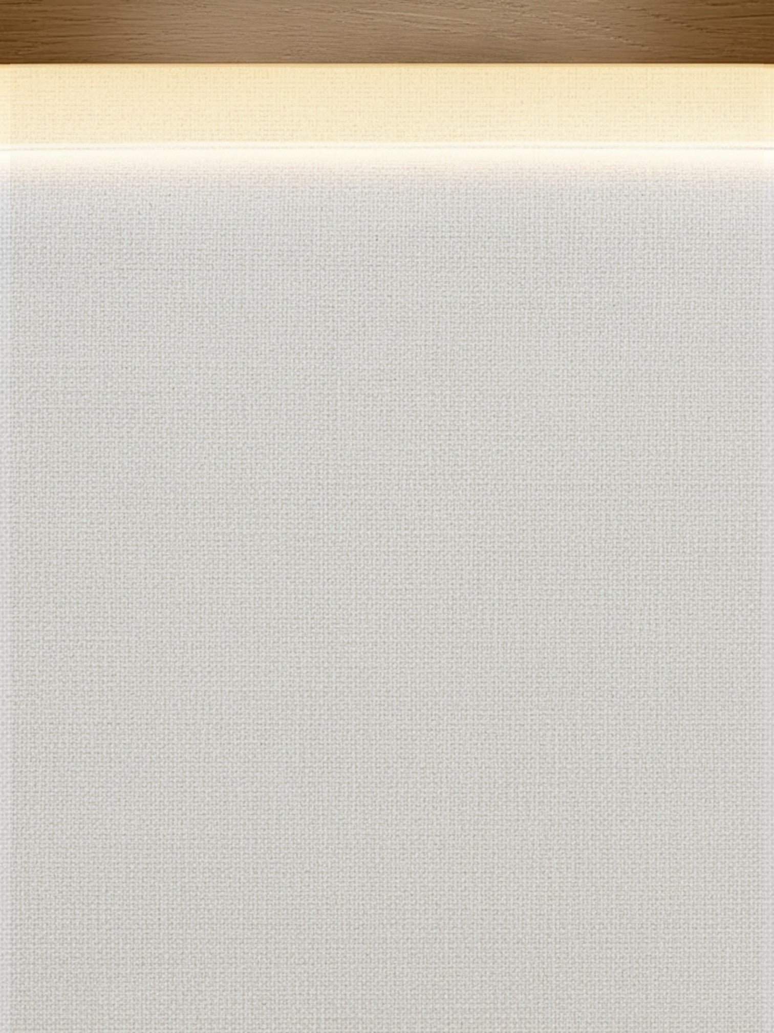 Gros plan sur la tête de lit rembourrée en tissu texturé beige avec éclairage DEL intégré de TOCO Meubles