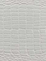 Gros plan sur la texture blanche embossée imitation alligator de la table de chevet Aurore par TOCO Meubles