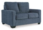 TOCO Meubles Canapé-lit Jabari 2 places bleu marine en tissu, design moderne avec coussins confortables.