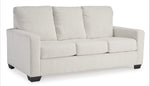 TOCO Meubles Canapé-lit Jabari 3 places blanc cassé en tissu texturé avec coussins moelleux et pieds noirs.