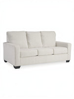 TOCO Meubles Canapé-lit Jabari 3 places blanc cassé en tissu texturé avec coussins moelleux et pieds noirs.