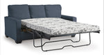 TOCO Meubles Canapé-lit Jabari 3 places bleu marine en tissu, matelas à motif floral déployé.