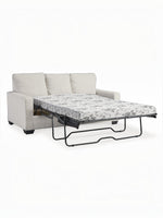 TOCO Meubles Canapé-lit Jabari 3 places beige en tissu, matelas à motif floral noir et blanc déplié.