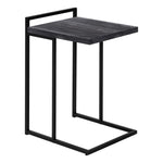 TOCO Meubles Eliott C-shaped side table with black wood-effect top and black metal frame.