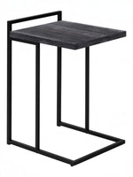 TOCO Meubles Eliott C-shaped side table with black wood-effect top and black metal frame.