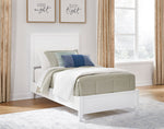 Lit simple blanc TOCO Meubles Gisele avec tête de lit à lattes et détails de planches, style contemporain.