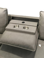 TOCO Meubles Sofa-lit Nia gris avec porte-gobelets intégrés et port USB.