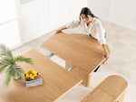 Table à manger ronde extensible Transformer en chêne scandinave – vue de dessus, mise en situation – Meubles TOCO